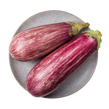 Graffiti eggplant. Two graffiti aubergine on gray plate isolated on white. Top view.