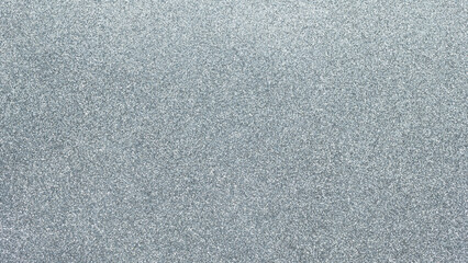 Fototapeta premium Silver glitter texture background with sparkling shimmer effect horizontal format
