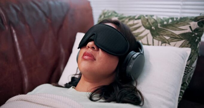 Headphones, psychology or woman eye mask in therapy for sensory deprivation, microdosing or PTSD. Audio, psilocybin and person with blindfold on sofa for anxiety, emotion regulation and counseling