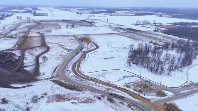 Oracle Stargate data center site preparation in Saline, Michigan, winter, Developing land for a major technology data center and future expansion during cold winter conditions