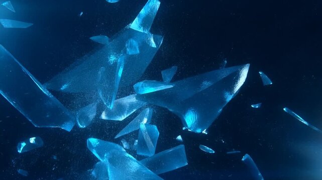 Slow motion tracking shot of blue glass shards exploding apart and floating through dark particle filled cosmic void with drifting crystalline fragments
