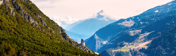 castle ruin schrofenstein and the tyrol landscape in spring panorama © Tobias Arhelger