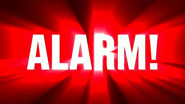 Zoom in shot of alarm! text bursting with red radial light and flashing rays on graphic screen background indicating emergency warning
