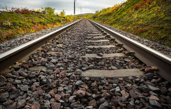 Stretch of railway tracks supported with heap of stones