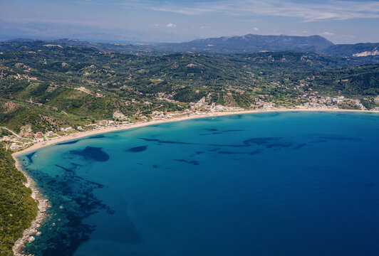 Aerial drone photo of Ionian Sea shore in Agios Georgios village on Corfu Island, Greece