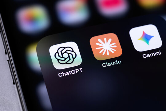 ChatGPT by OpenAI, Claude by Anthropic, Gemini by Google mobile icons app on a screen smartphone iPhone. Claude, ChatGPT, Gemini are leading AI-powered chatbots. Batumi, Georgia - February 19, 2026
