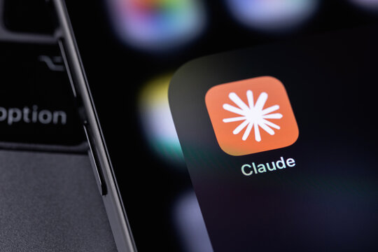 Claude Anthropic mobile icon app on a screen smartphone iPhone. Claude is a family of large language models developed by Anthropic. Batumi, Georgia - February 19, 2026