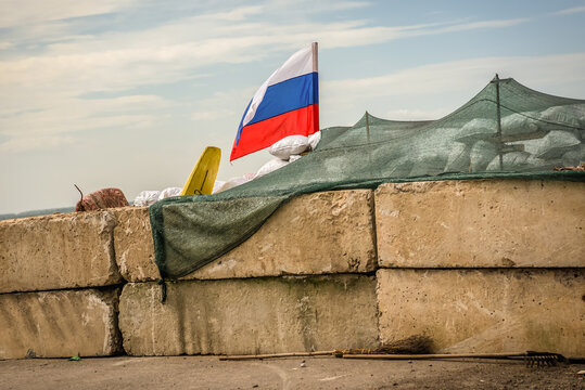 Russian flag on Pro-russian separatists post in Semionovka near Sloviansk during Russo-Ukrainian War in Donbas, Ukraine