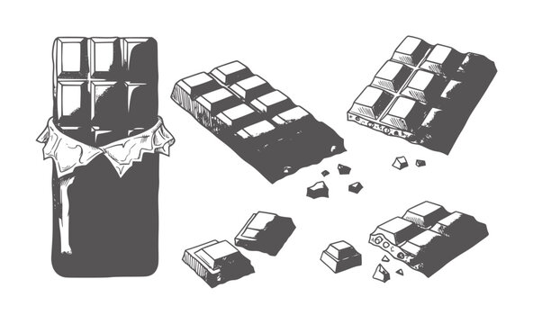 Black and white of a partially unwrapped breaking chocolate bar wrapper