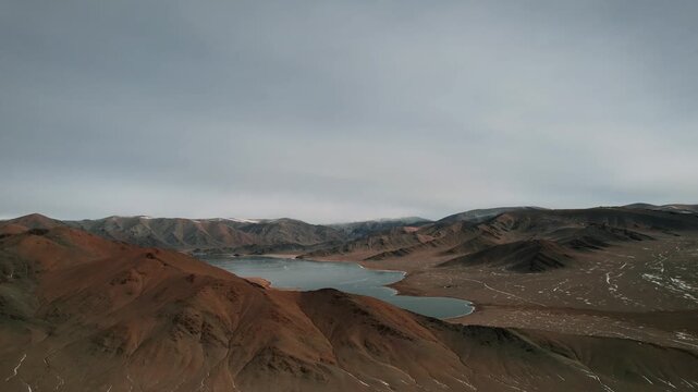 Aerial View Of Dund Lake Bayan Ulgii Mongolia With Snowy Mountains