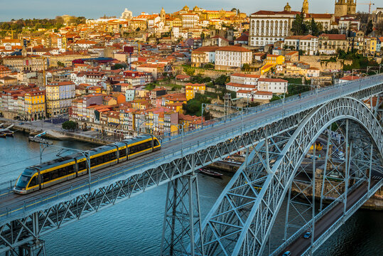 Eurotram light railway train on Dom Luis I Bridge and Porto, view from Vila Nova de Gaia, Portugal