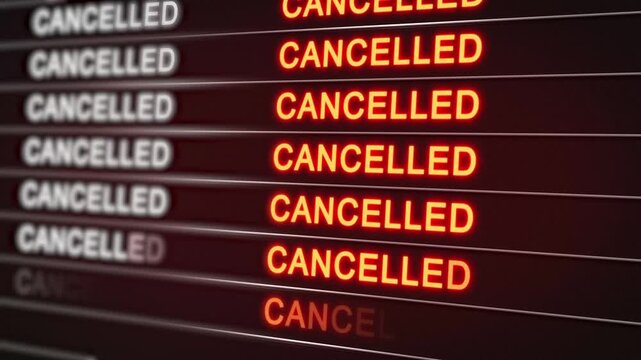 Multiple Cancelled Messages On Red LED Board.  Flight Cancellation Notices, travel disruption, airline delays, crisis situations, transportation issues Concepts. 