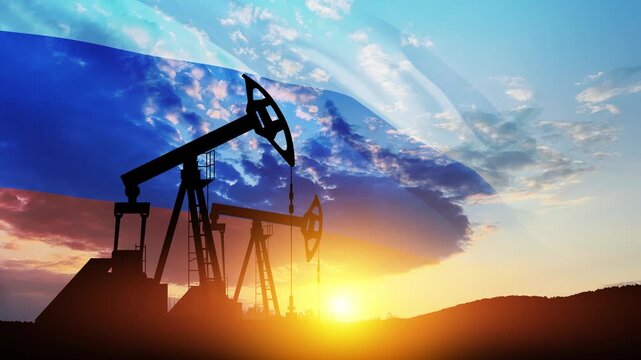 The change in oil prices caused by the war. Oil prices are rising because of the global crisis. Oil drilling derricks at desert oilfield with Russia flag. Crude oil production from the ground.