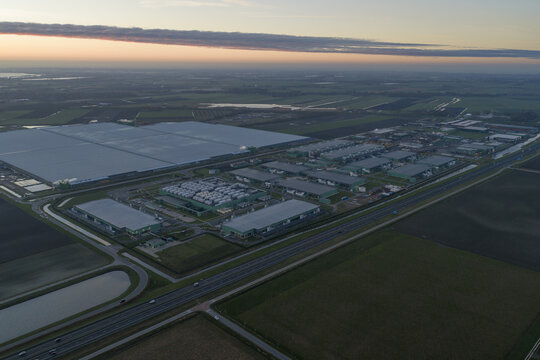 Aerial view of data center campus at sunset, Middenmeer, Netherlands.