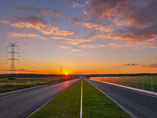 Fototapeta premium A beautiful sunset over the new highway in Poland.