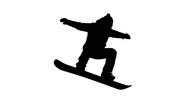 Silhouette of a person snowboarding on a in a dynamic pose