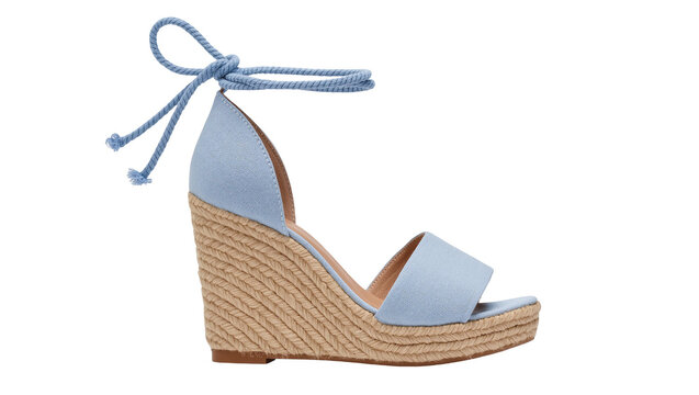 Isolated light blue espadrille wedge sandal with rope ankle ties for summer fashion