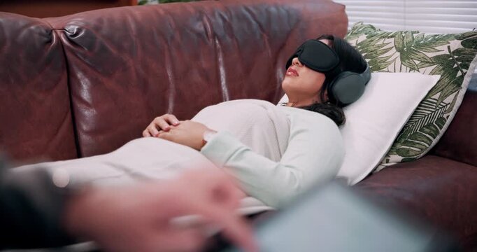 Consultation, therapy and woman with blindfold, headphones and session for recovery or support. Counselor, psychologist and patient with sensory depravation for mental health, check up and help