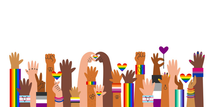 Multiple hands with different skin tones and LGBT flags and symbols in a horizontal composition. Concept of diversity, inclusion, pride, equality, identity and support for the LGBTQ community.