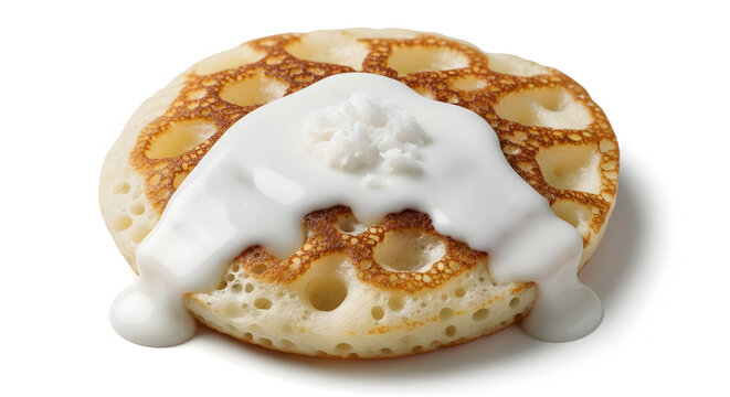 Soft Indonesian street pancake topped with sweet coconut sauce