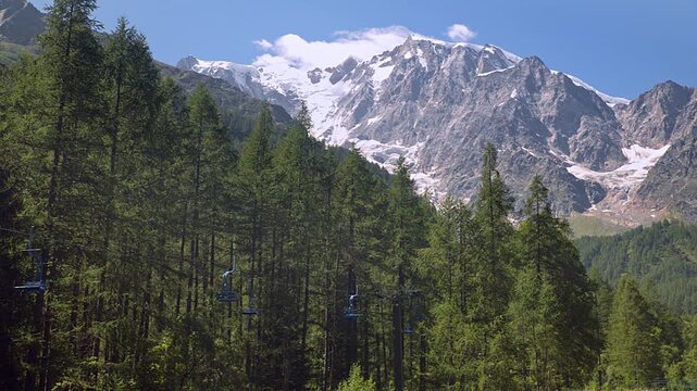 Chair lift on the italian alps in summer. Vacation and hiking concept. Macugnaga, Italy, chair lift at the foot of the spectacular east face of Monte Rosa, Anzasca Valley, piedmont region