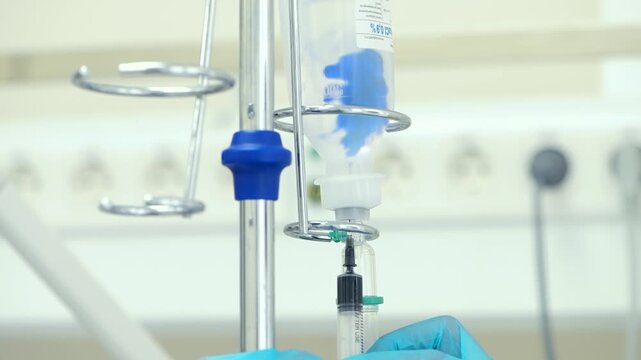 Modern medical laboratory equipment used for chemistry research and healthcare blood tests features advanced technology like microscopes and liquid tubes in a sterile hospital lab environment