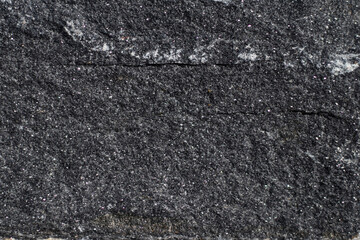 Naklejka premium Gneiss rock textured glittered side close up view