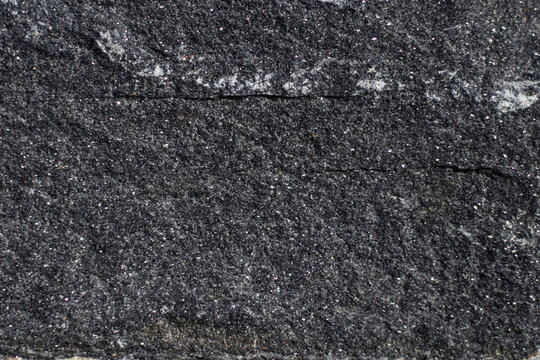 Gneiss rock textured glittered side close up view
