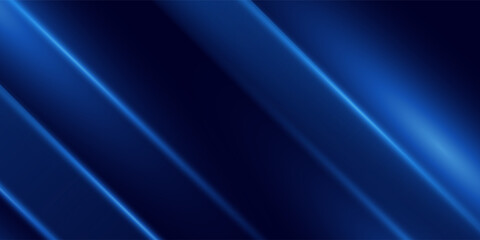 Fototapeta premium Elegant abstract background featuring dark blue gradients with sharp glowing diagonal light lines.