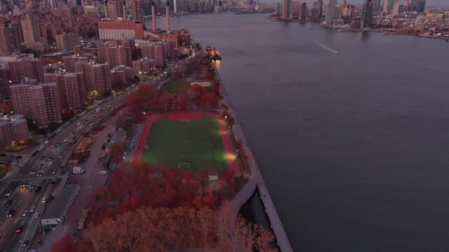 East river NYC with FDR at dusk during Manhattanhenge