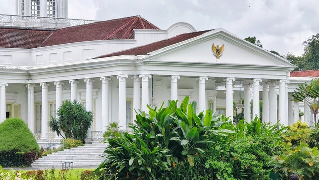 Grand Presidential Palace with Columns and Lush Greenery