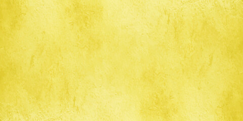 Naklejka premium Vibrant yellow textured background with abstract parchment effect and mottled grunge surface for creative design