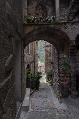 Obraz premium Narrow street, Montalto ancient village, Imperia, Italy