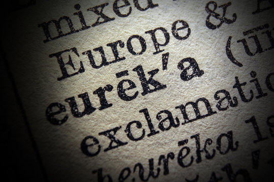 Word eureka printed on dictionary page, macro close up