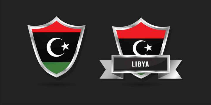High-quality 3D metallic shield and ribbon featuring the national flag of Libya. Glossy silver emblem for Libyan branding, international icons, and patriotic identity.
