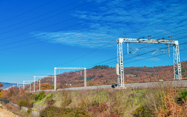 Fototapeta premium High-Speed Train Railway near a Construction Site