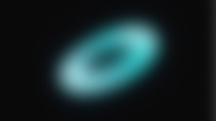Abstract teal and black blurred shape resembling a cosmic nebula © Md