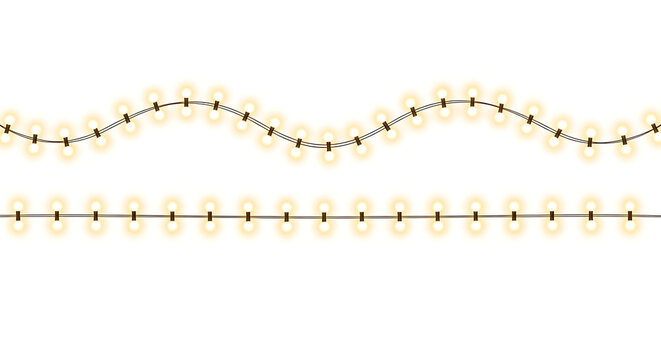Two strings of glowing yellow string lights on white