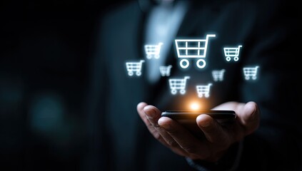 Fototapeta premium Person holding phone with glowing shopping carts appearing from screen