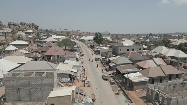 Drone video of a slum community in Kubwa, Bwari Area Council, Abuja, Nigeria, filmed in March 2026. The footage captures densely populated housing structures and narrow pathways.
