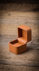 Obraz premium Open, terracotta box on weathered, dark wooden surface
