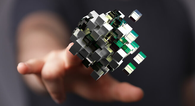 Abstract image of a hand interacting with a 3D cube representing technology, data, and connection. Concept of innovation