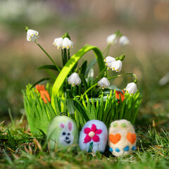 happy easter party with easter eggs from felt fabric