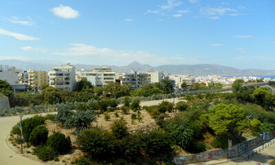 Obraz premium Greece, Crete, Heraklion, Nikos Kazantzakis and Manos Hatzidakis Park, view of the city and mountains