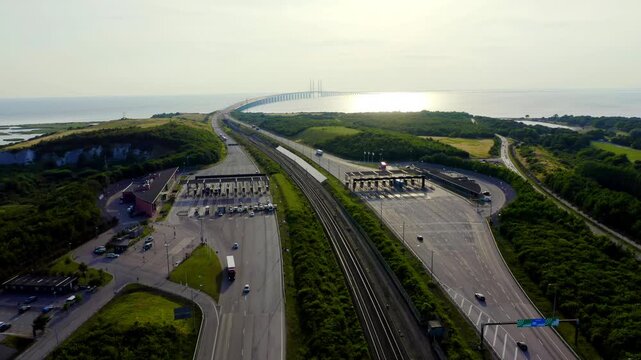 Malmo, Sweden. Car payment point. Oresund bridge. A long tunnel and bridge with an artificial island between Sweden and Denmark. Drone footage, Departure of the camera