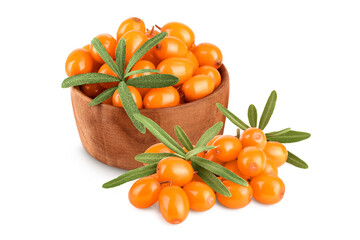 Sea buckthorn in wooden bowl. Fresh ripe berry with leaves isolated on white background macro