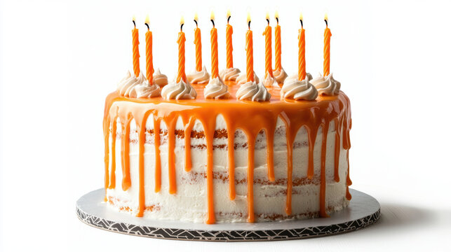 Orange birthday cake with lit candles and creamy frosting dripping on white background