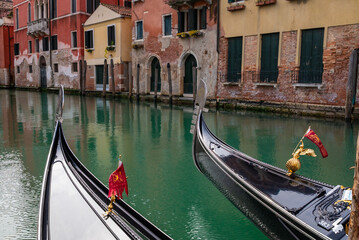 Close-up of the ornate ferro, the nose of a Venetian gondola in Venice, Italy. © Yuliya Ihnatkovich