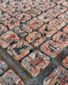 Aerial view of the Eixample district featuring iconic octagonal blocks and a dense urban grid layout Barcelona, Catalonia, Spain.