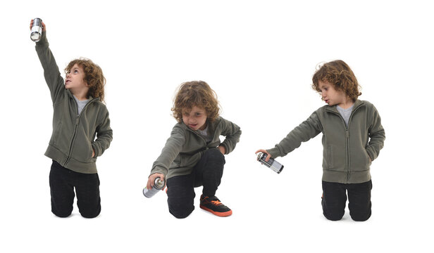 several poses of the same child kneeling with spray paint